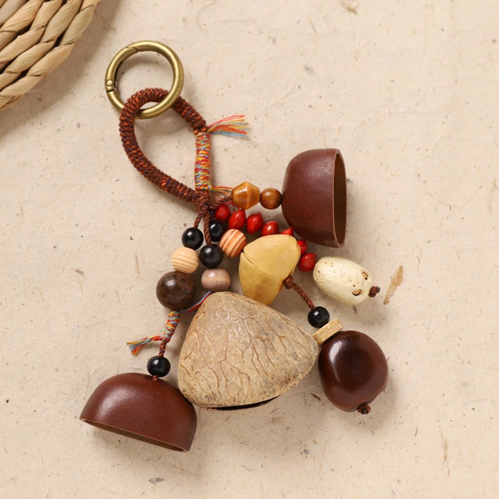 Boho Wind Chimes - Klangheilender Schlüsselanhänger aus natürlichen Fruchtschalen im